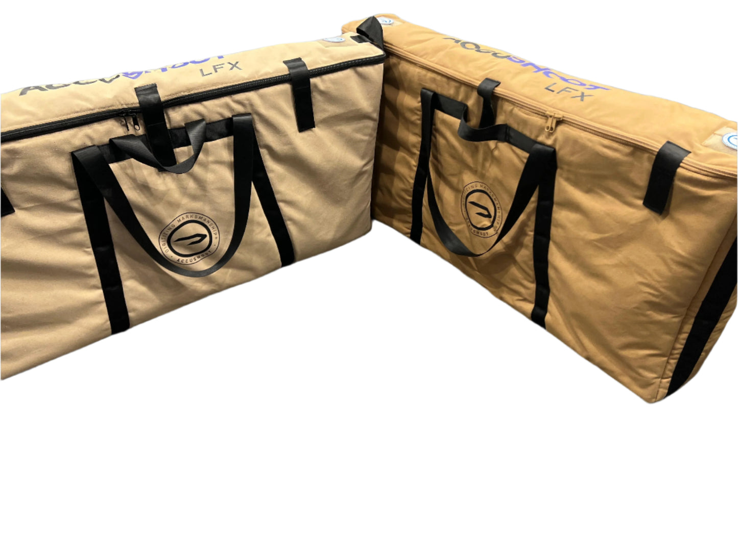 Two beige bags with black straps on a gray floor